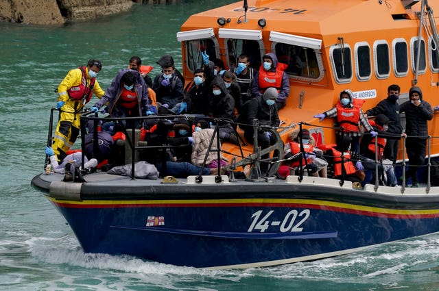 A group of people thought to be migrants are brought in to Dover, Kent, onboard a lifeboat 