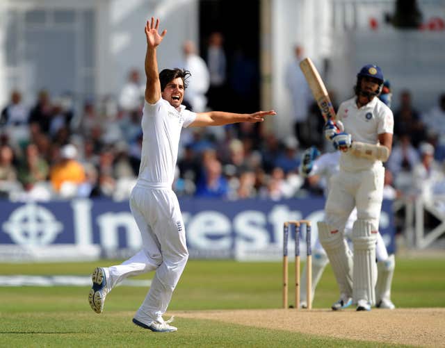 Alastair Cook (left) celebrates after taking the wicket of India’s Ishant Sharma