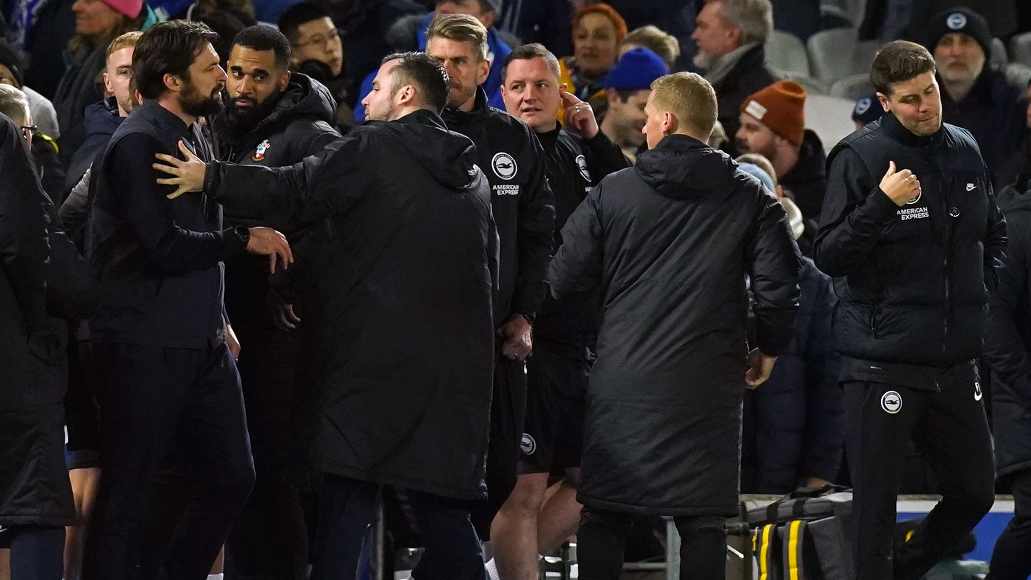 Southampton manager Russell Martin, left, and Brighton boss Fabian Hurzeler, centre left, react at full-time (Gareth Fuller/PA)