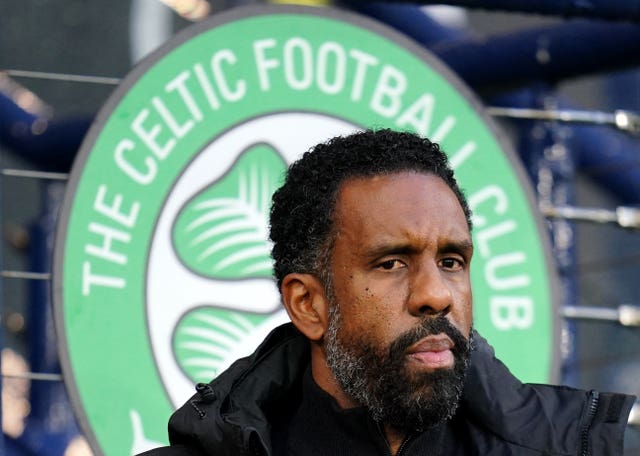 Wilfried Nancy sits in front of a Celltic badge at Hampden