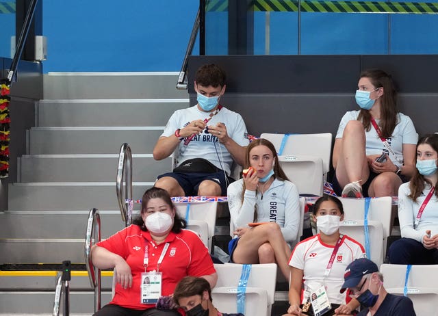 Daley, top left, has been pictured knitting on several occasions during the Olympics (Martin Rickett/PA)