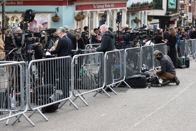 Members of the media gather outside Windsor Castle