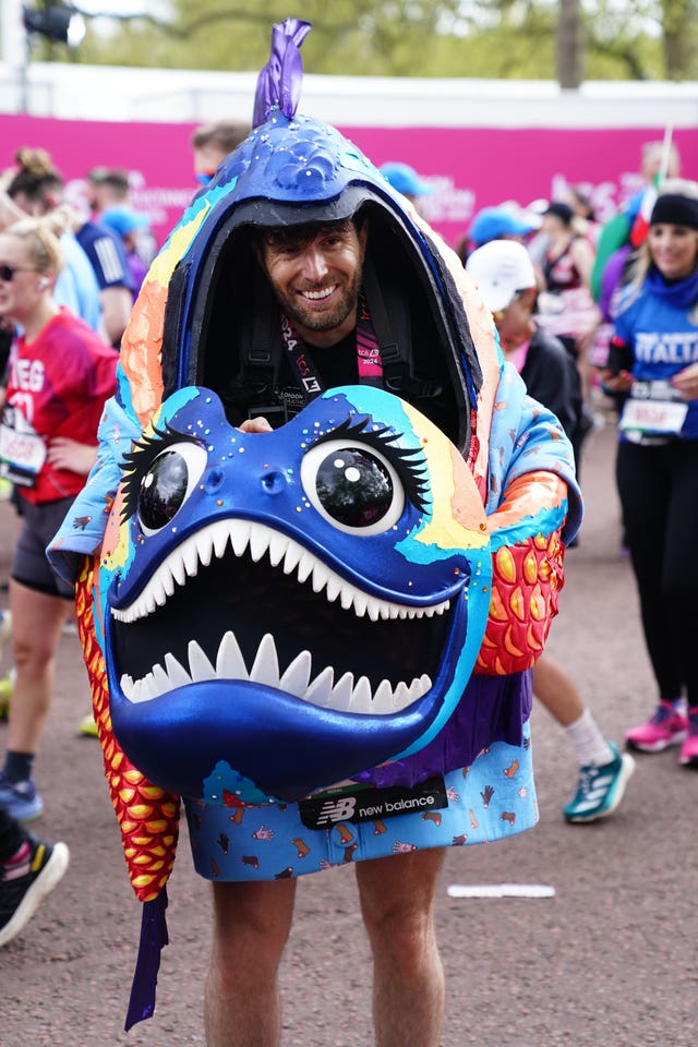 Joel Dommett after finishing the 2024 TCS London Marathon dressed in the Piranha costume from The Masked Singer