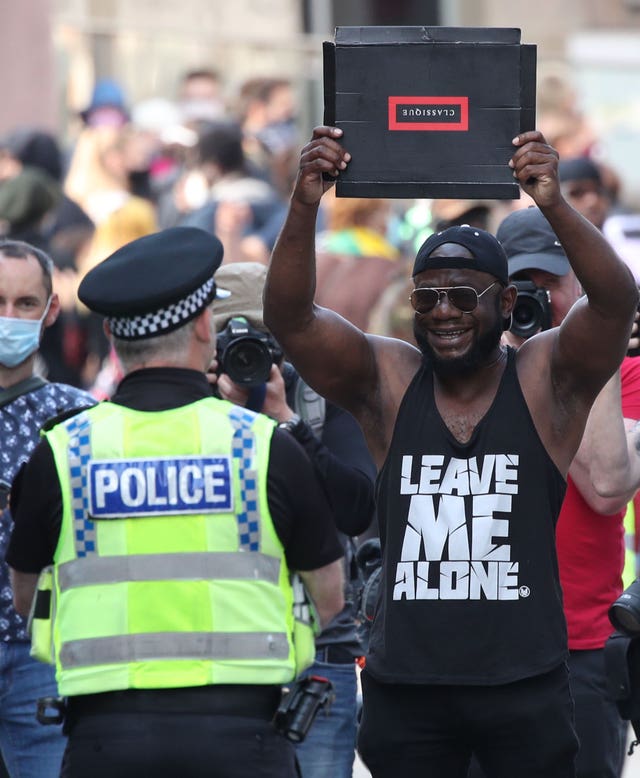 Police and protester at Black Lives Matter protests