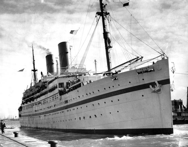 A black and white picture of the Empire Windrush ship