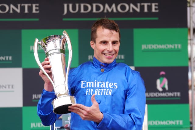 William Buick will the trophy for the Juddmonte International