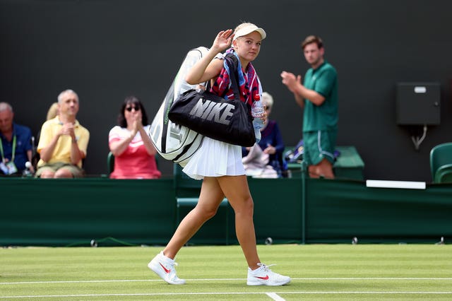 Katie Swan acknowledges the fans after losing on Court Three