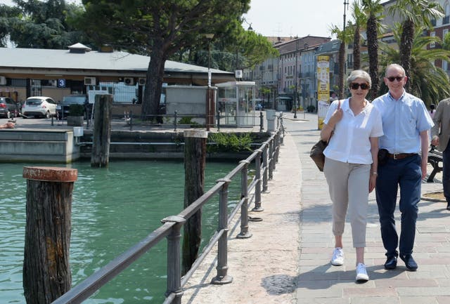 Theresa May and her husband Philip visit Desenzano del Garda while on holiday (Pier Marco Tacca/PA)