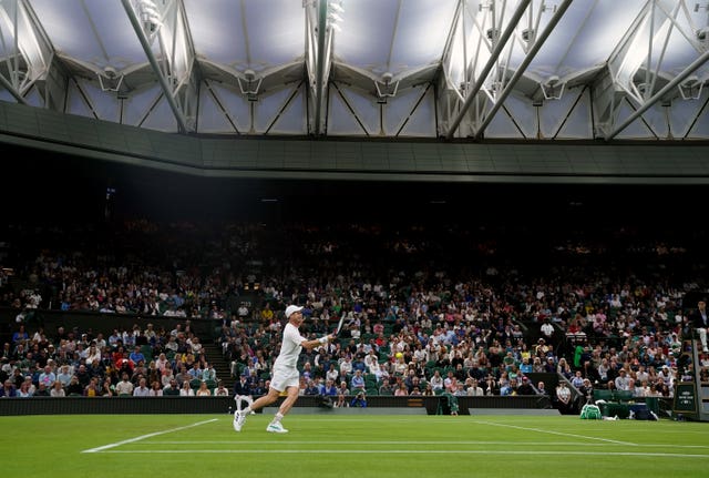 Andy Murray won under the Centre Court roof
