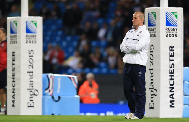 England rugby head coach Stuart Lancaster stands in front of the posts