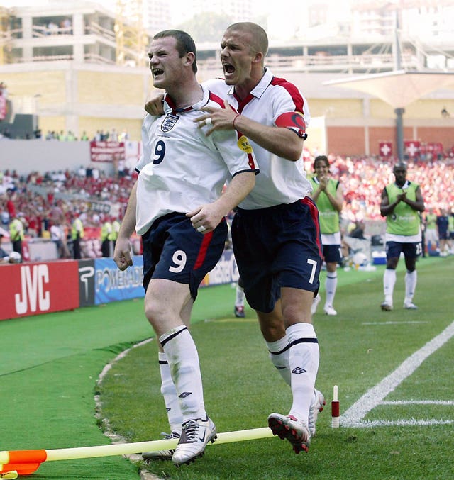 David Beckham (right) and Wayne Rooney celebrate at Euro 2004 (PA)