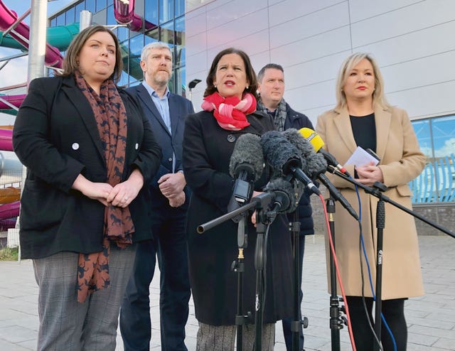 Sinn Fein president Mary Lou McDonald (centre) and vice president Michelle O’Neill (right) speaking to media outside Andersonstown Leisure Centre in west Belfast 