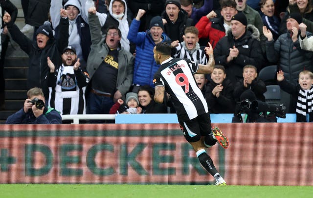 Callum Wilson celebrates after firing Newcastle to their first Premier League victory of the season at the 15th attempt