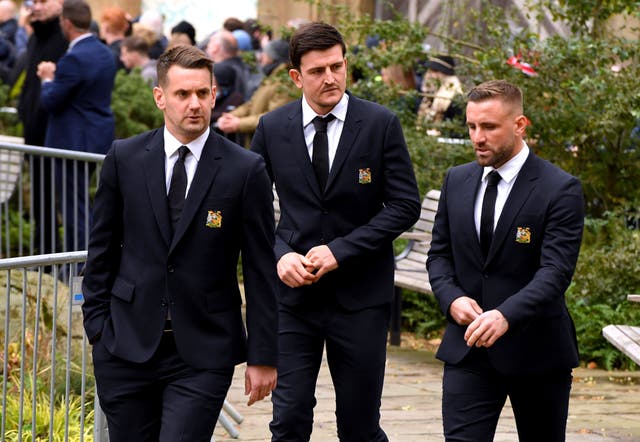 Manchester United players Tom Heaton, Harry Maguire and Luke Shaw arrive (Andy Kelvin/PA)