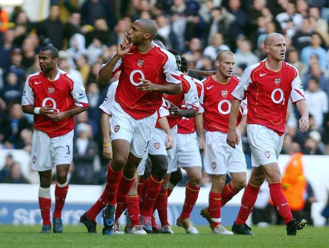 Thierry Henry scored Arsenal's first goal as they hit five past Spurs in an enthralling league win. 