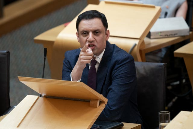 Anas Sarwar pointing while seated in Holyrood