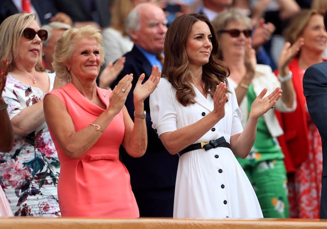 The Duchess was on her feet to applaud the players 