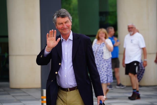 Vice Admiral Sir Tim Laurence leaves Southmead Hospital in Bristol