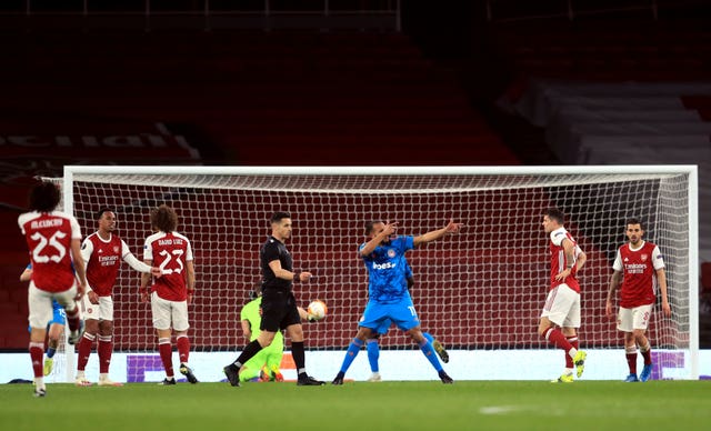 Youssef El-Arabi celebrates scoring for Olympiacos