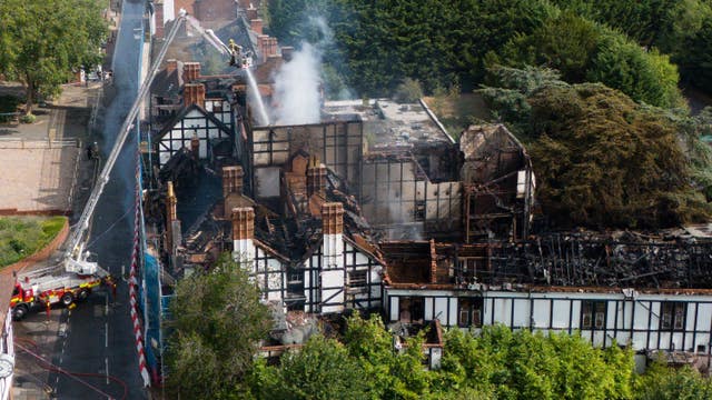 An aerial view of firefighters working at the scene on Monday
