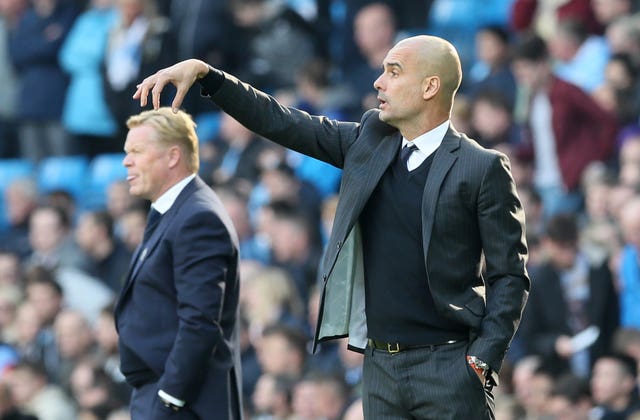 Manchester City manager Pep Guardiola appears to tickle the head of Everton boss Ronald Koeman during a 1-1 draw at the Etihad Stadium in October 2016. Koeman was sacked by the Toffees a year later, while Guardiola recovered from a trophy-less first season in England by winning successive Premier League titles, two Carabao Cups and an FA Cup