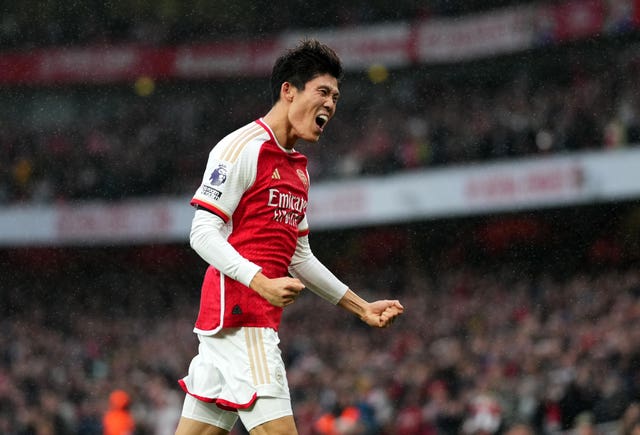 Takehiro Tomiyasu celebrates scoring his first Arsenal goal against Sheffield United