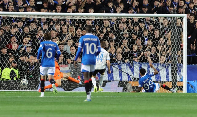Danilo slides to score