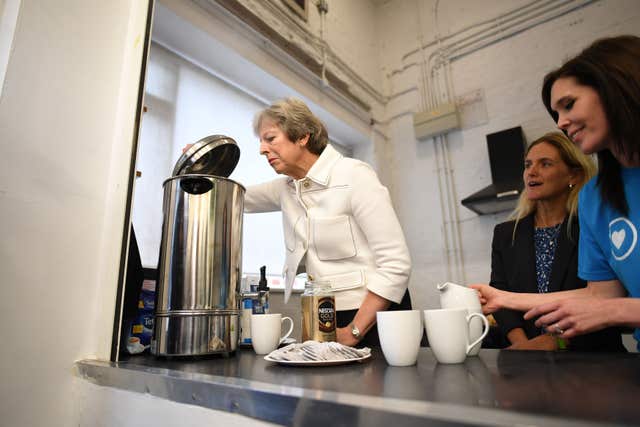 Theresa May at the charity cafe