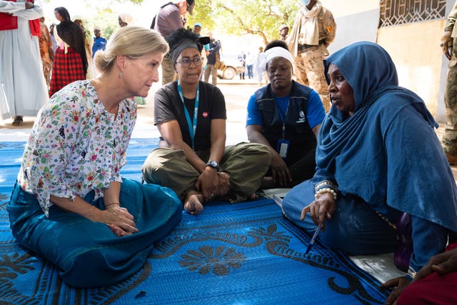 The Duchess of Edinburgh meets a woman during a visit to Chad