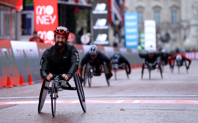 Canada’s Brent Lakatos wins the wheelchair race 