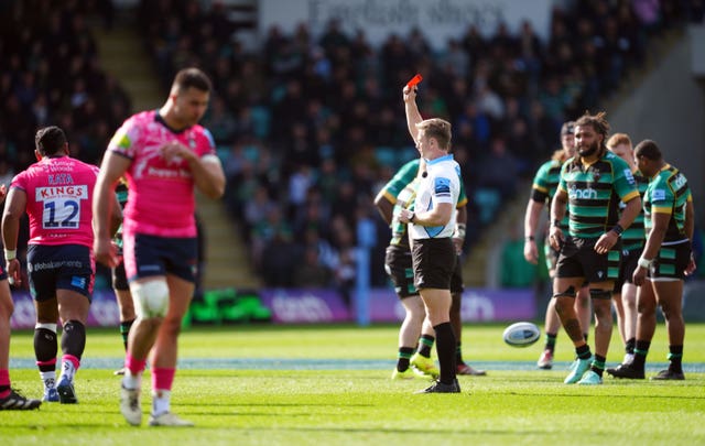 Referee Christophe Ridley shows a red card to Leicester's Solomone Kata