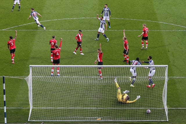 West Brom's Mbaye Diagne celebrates before having the goal ruled out for offside 