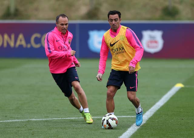 Font also wants the likes of Andres Iniesta, left, and Xavi to return to the club