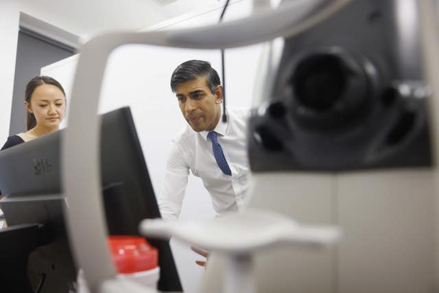Rishi Sunak is shown a retinal scan procedure during a visit to Moorfields Eye Hospital