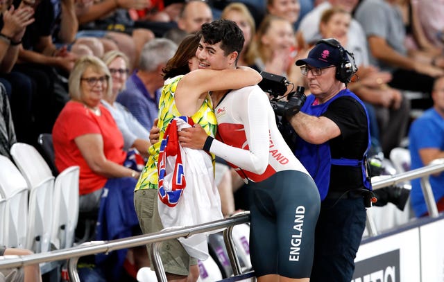 England’s Charlie Tanfield (right) celebrates with mum Clare (left) winning gold in the men’s 4000m individual pursuit finals at the Anna Meares Velodrome