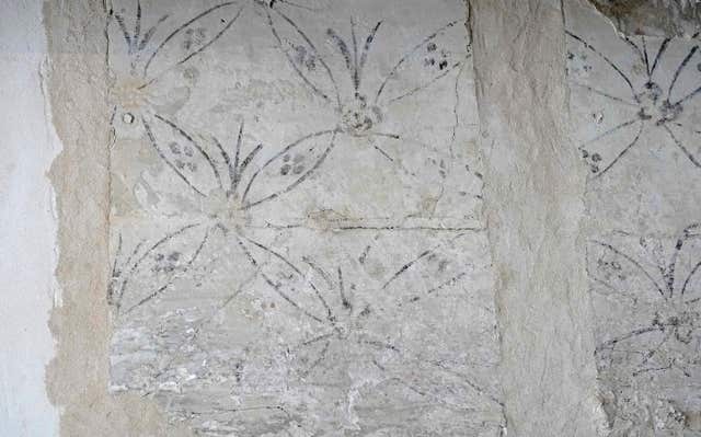 Detail of wall paintings dating back hundreds of years have been found during the work (Owen Humphreys/PA)