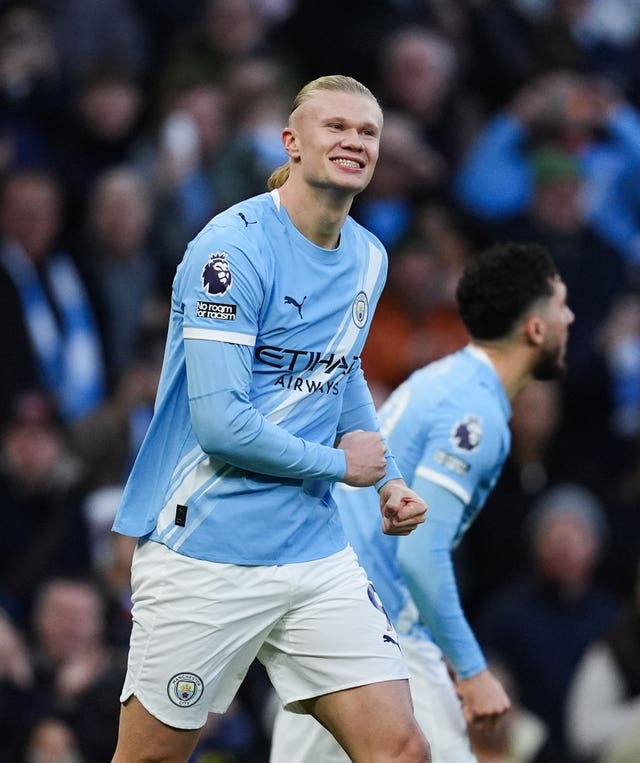 Erling Haaland celebrates scoring the opening goal