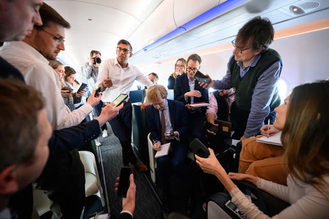 Prime Minister Rishi Sunak speaks to members of the travelling media during his flight to San Diego in the US