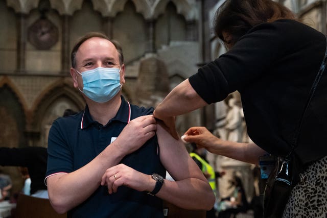 Sir Simon Stevens pictured in March receiving his coronavirus vaccine