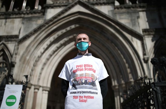 Protesters outside the Royal Courts of Justice