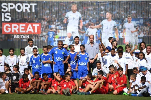 William and footballer Tomer Hemed attend a football session