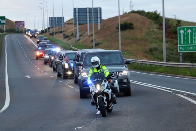 The Trump motorcade on the A77 in Maybole, South Ayrshire, as it arrives at his Turnberry golf resort 