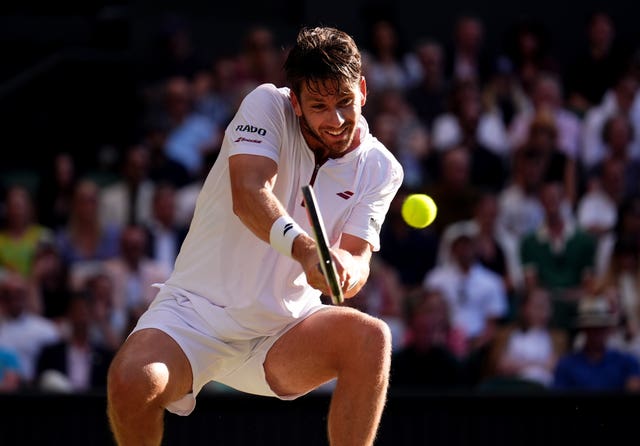 Cameron Norrie hits a backhand