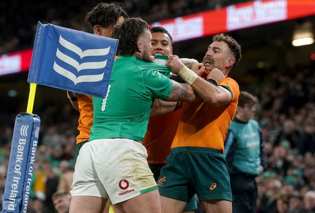 Australia's Nic White, right, should have been taken off during his country's defeat to Ireland after suffering a head injury