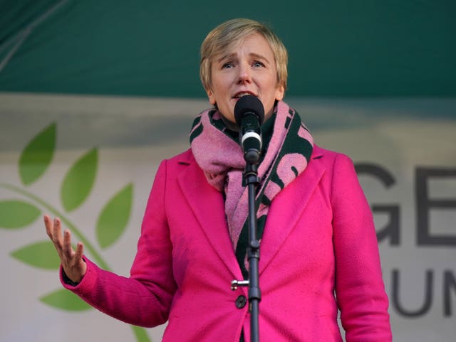 Stella Creasy speaking into a microphone at a anti-hate vigil