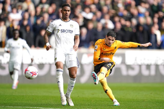 Pedro Neto shoots at the Leeds goal