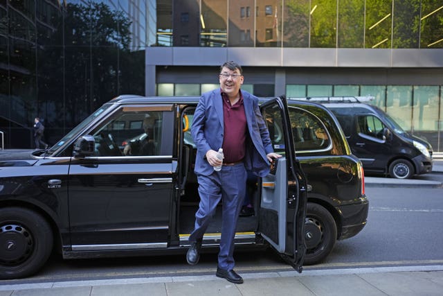 Graham Linehan getting out of a car outside Southwark Crown Court 