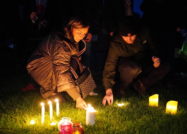 People during a candlelight vigil at Belfairs Recreation Ground (Dominic Lipinski/PA)