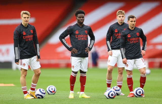 Arsenal’s Martin Odegaard, Bukayo Saka, Emile Smith Rowe and Cedric Soares 