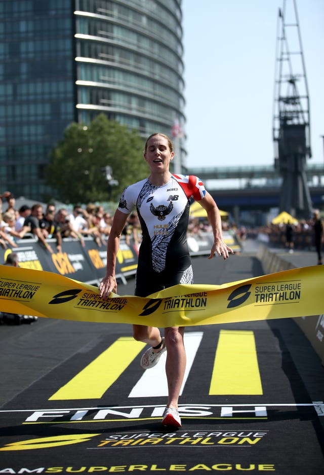 Britain's Jess Learmonth crosses the line first